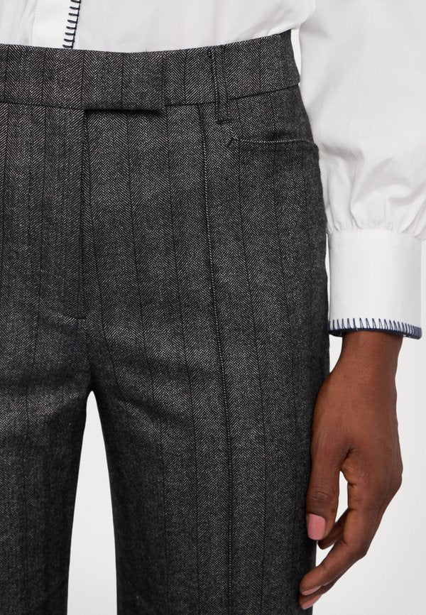 REMAIN STRIPED SLIM PANTS
