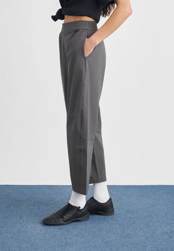 Nike Sportswear BARREL PANT - Trousers - thunder grey/dark shadow