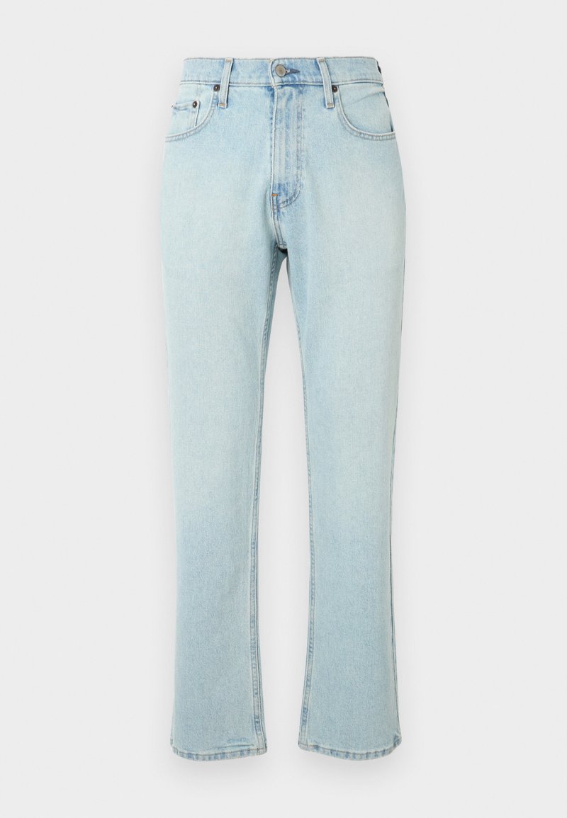 Helles blauschwarzes Denim mit geradem Schnitt, hoher Taille und geringfügiger Ausbleichung. Ausgefranster Saum mit fünf Gürtelschlaufen und traditioneller Hardware.