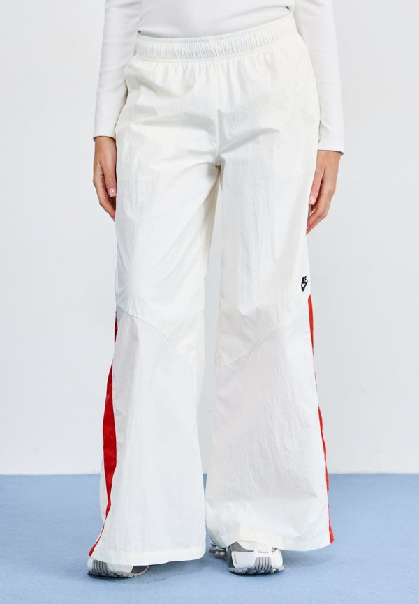 Nike Sportswear Tracksuit bottoms - sail/picante red/black