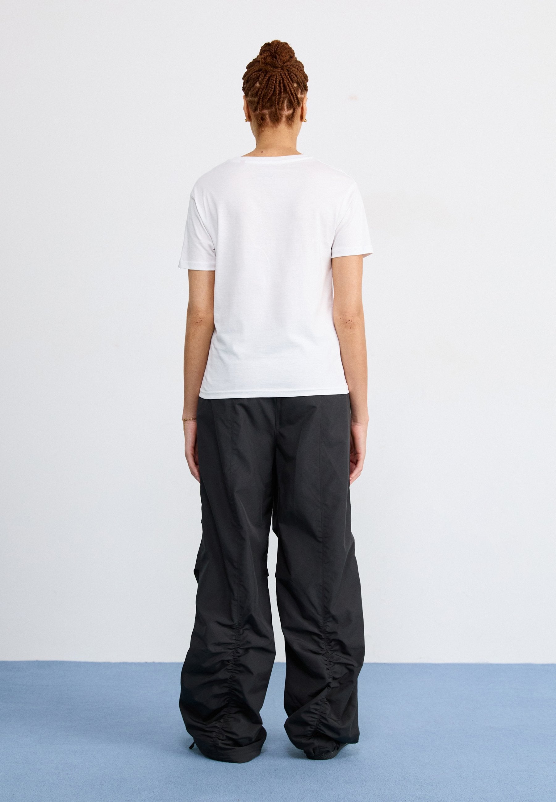 Puma WARDROBE ESS PARACHUTE WOVEN PANTS OP
