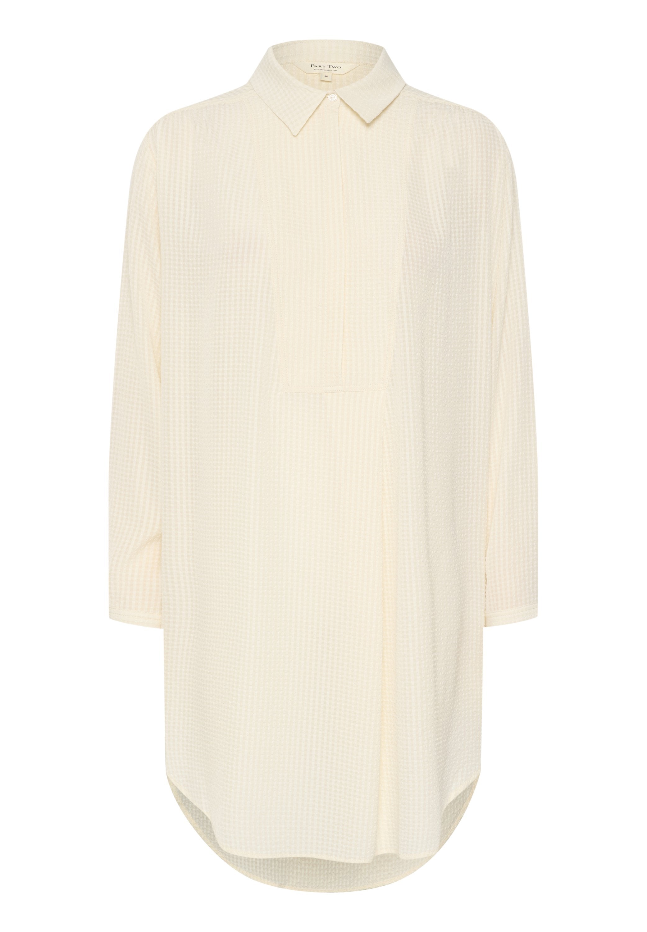 Helle beige Langarmshirt mit spitzem Kragen, strukturierter Karomusterung und abgerundetem Saum. Mit einer Falten-Detailierung an der Vorderseite.