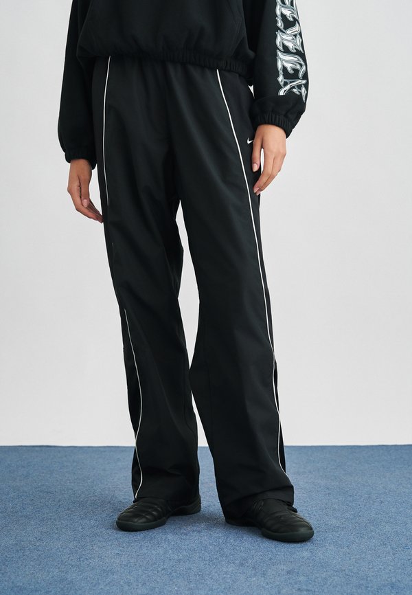 Nike Sportswear TRACK PANT - Tracksuit bottoms - black/sail