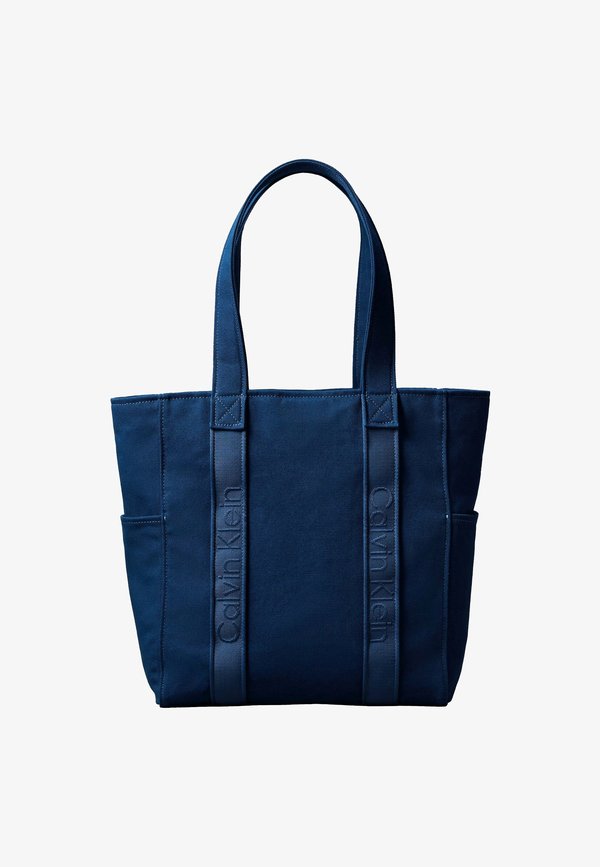 Calvin Klein WEBBING STRAP TOTE - Tote bag - ensign blue