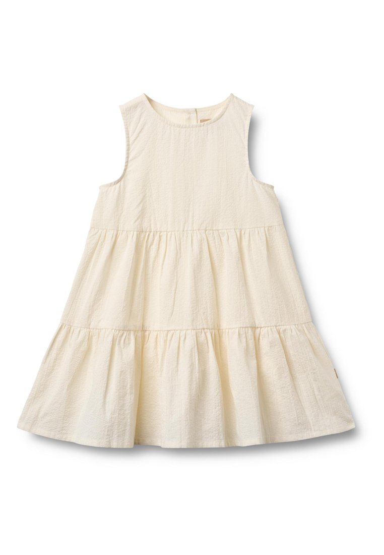 Hellcremiges Kleid mit ärmellosem Design, mehrlagigem Rüschensaum, strukturiertem Stoff und rundem Ausschnitt. Schlichte und fließende Silhouette.