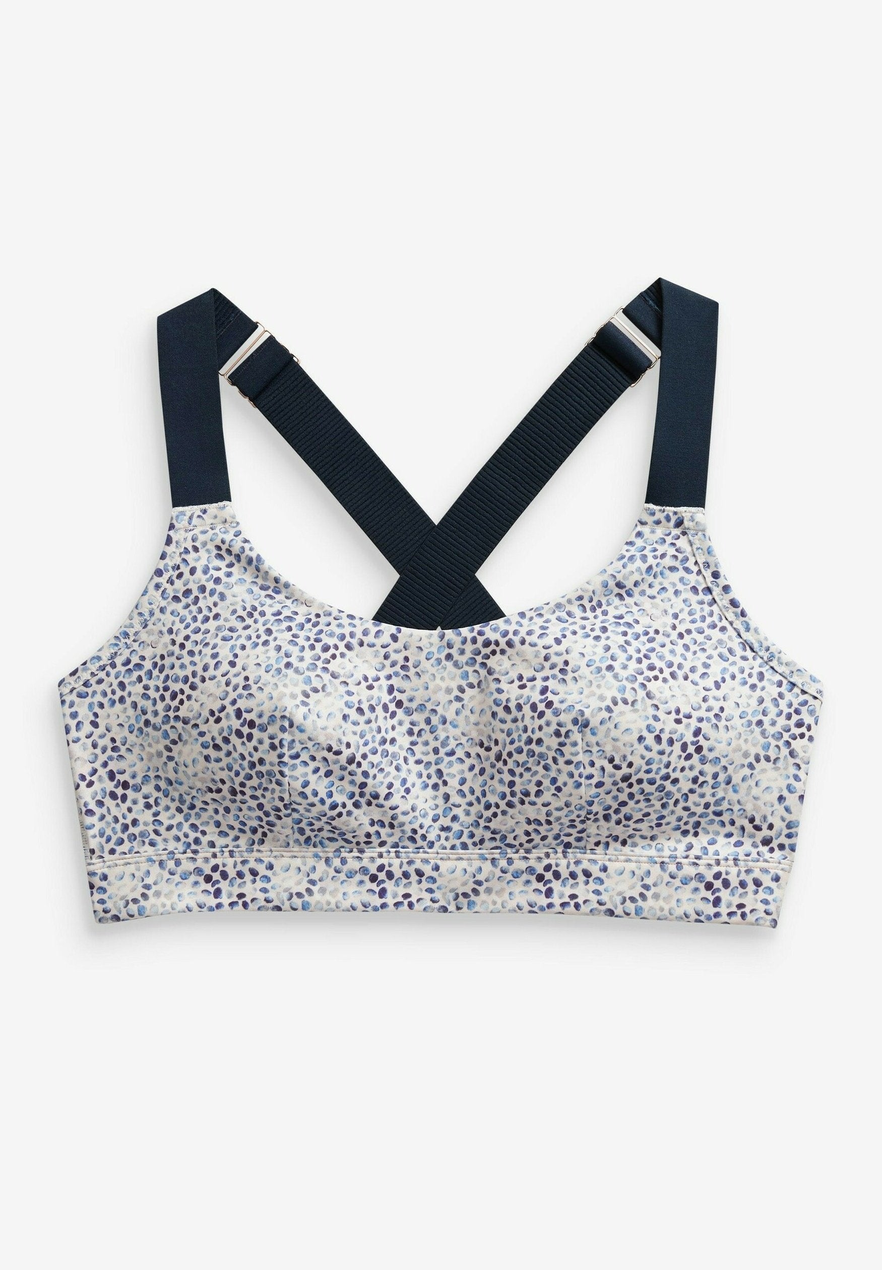 Gemusterter Bralette in Weiß mit blauen und lila Punkten. Verfügt über überkreuzte marineblaue Träger und eine weiche Textur für zusätzlichen Komfort.