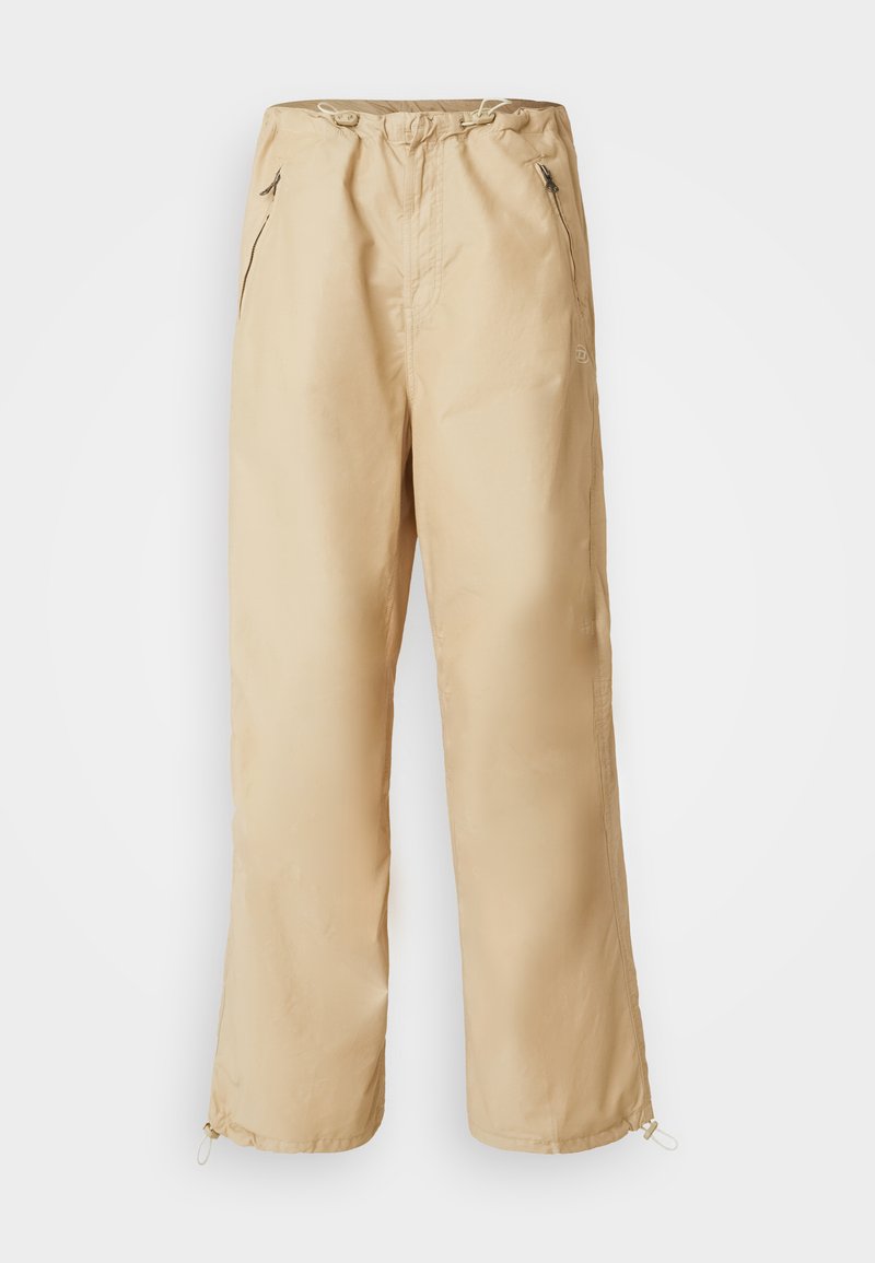 Beige, leichte Hose mit Kordelzugbund, seitlichen Reißverschlüssen und elastischen Bündchen. Glatte Textur, gerades Bein Design.