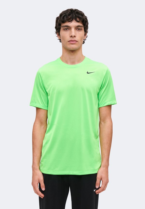 Nike Performance TEE RESET - Sports T-shirt - green strike/black