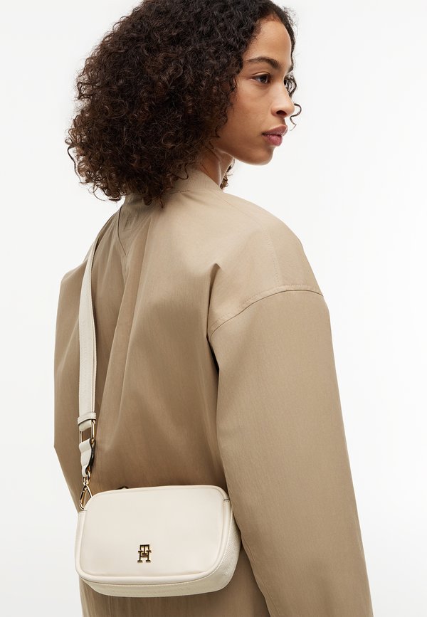 Tommy Hilfiger LOGOTAPE CAMERA - Cross body bag - soft cream