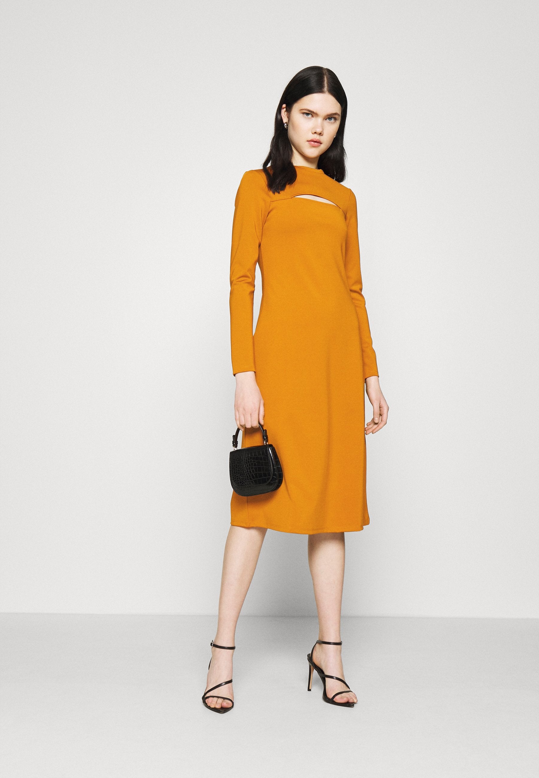 NU-IN STEFANIE GIESINGER CUT OUT MOCK NECK MIDI DRESS