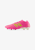 New Balance TEKELA V5 PRO FG - Firm-ground football boots - pink heat / metallic gold / pink satin