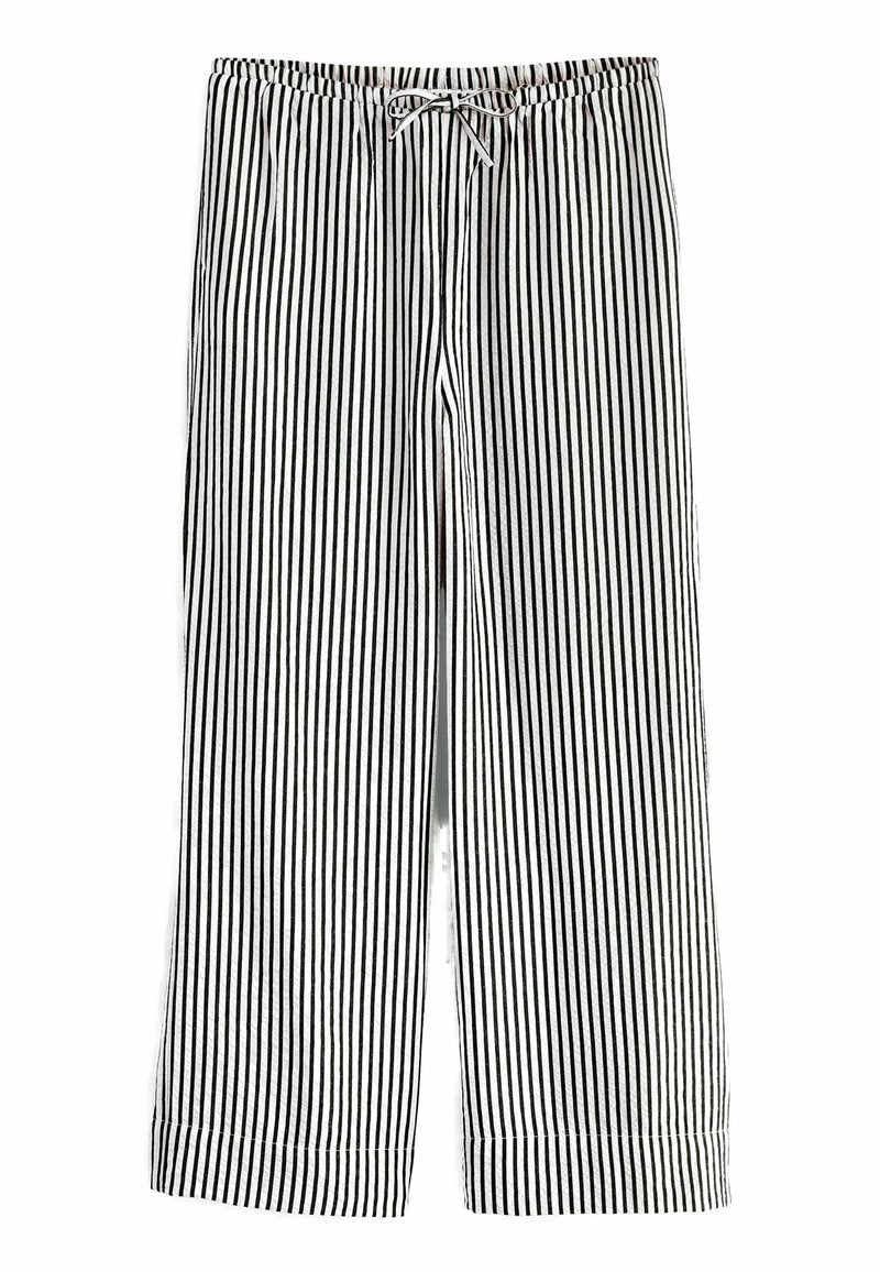 Schwarz-weiße, gestreifte weit geschnittene Hose mit einem elastischen Bund und Kordelzug, hergestellt aus einem weichen, strukturierten Stoff, der einen lässigen Sitz bietet.
