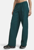 Under Armour UNSTOPPABLE WOVEN - Trousers - arden green