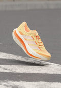 adidas Performance ADISTAR BYD 2 - Road running shoes - acid orange/chalk white/beam orange