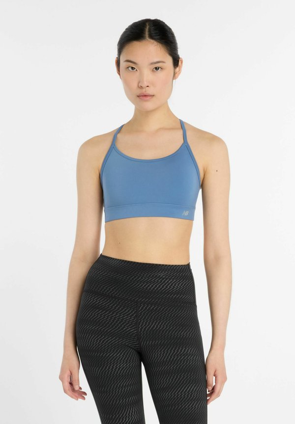 New Balance NB ESSENTIAL YOGA BRA - Light support sports bra - shoreline blue