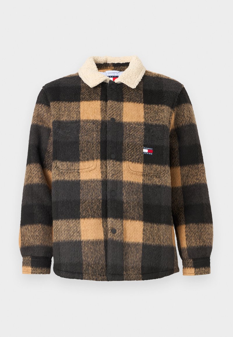 Button-up Fleece-Hemd im Schwarz und Beige karierten Muster. Mit einem cremefarbenen Sherpa-Kragen und zwei vorderen Taschen. Weicher Stoff überall.