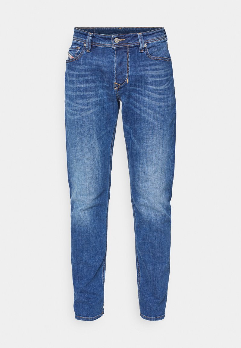 Blaue Jeans aus Denim mit geradem Schnitt, mit einer ausgewaschenen Optik, fünf Taschen und kontrastierenden Nähten entlang der Nähte.