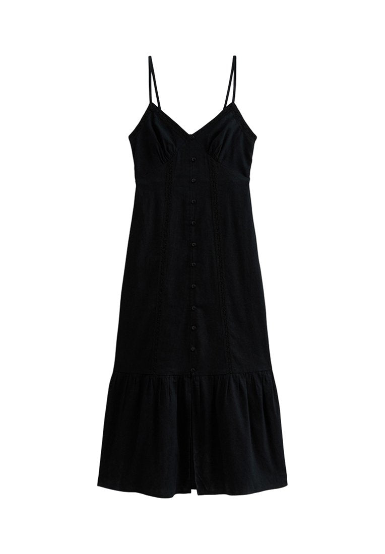 Schwarzes ärmelloses Kleid mit verstellbaren Spaghettiträgern, vorderer Knopfverschluss, gerafftem Rock und subtiler Texturierung am Oberteil.