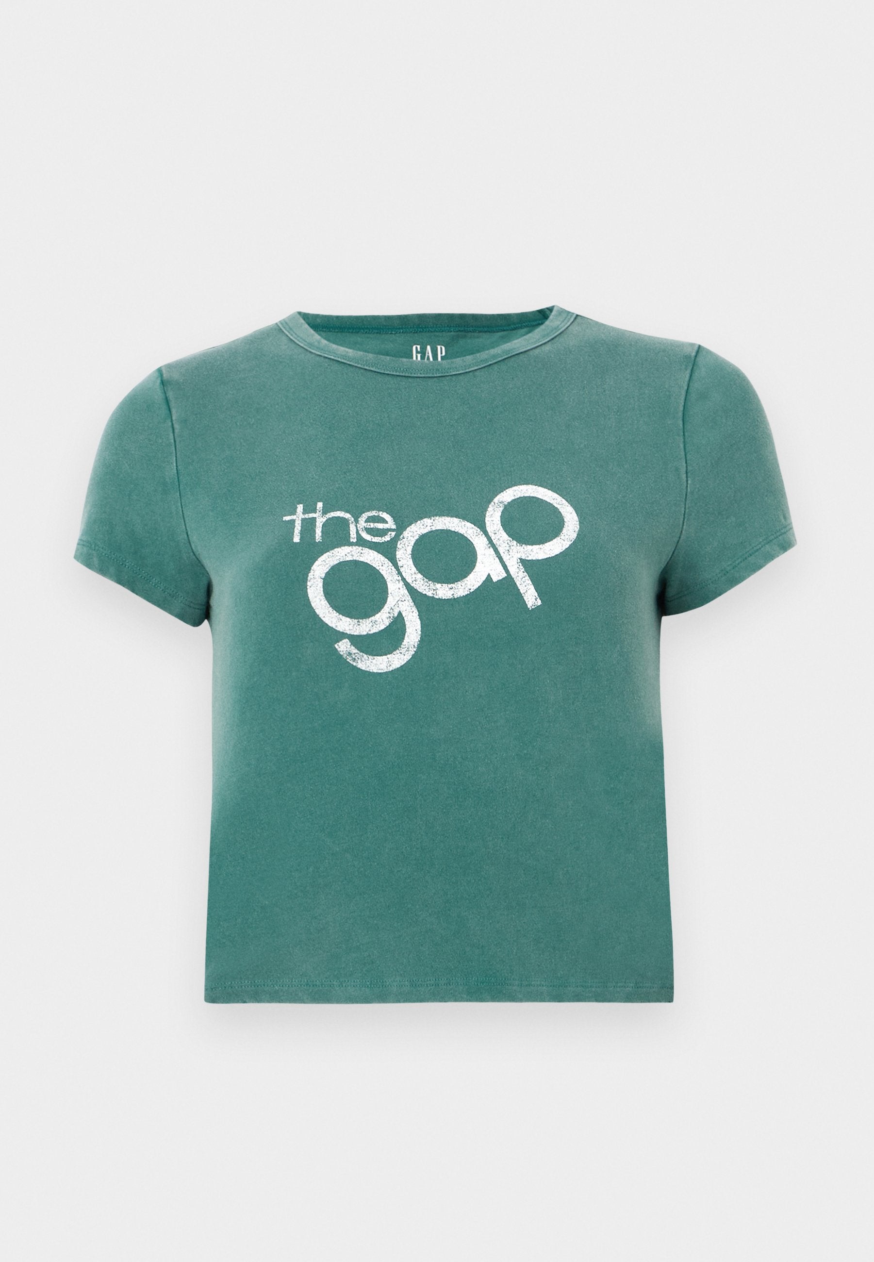 Grünes T-Shirt mit kurzen Ärmeln aus Baumwolle, vorne mit dem weißen Aufdruck "the gap". Gekürztes Design mit rundem Halsausschnitt.