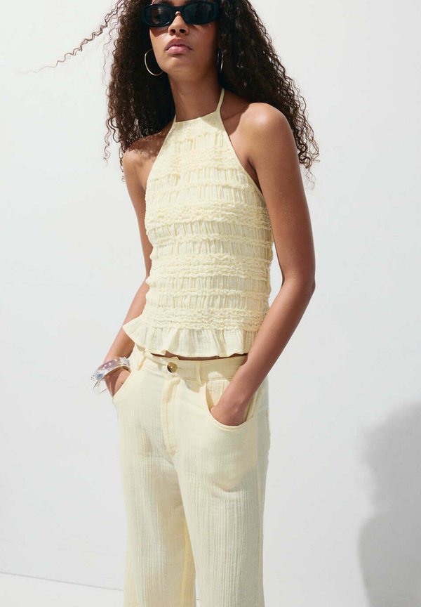 Mango ADULT - Trousers - light yellow