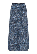 Ein schwingender, knielanger Rock mit einem marineblauen Grundton, der mit einem verstreuten, hellblauen und weißen abstrakten Muster versehen ist, aus weichem Stoff gefertigt.