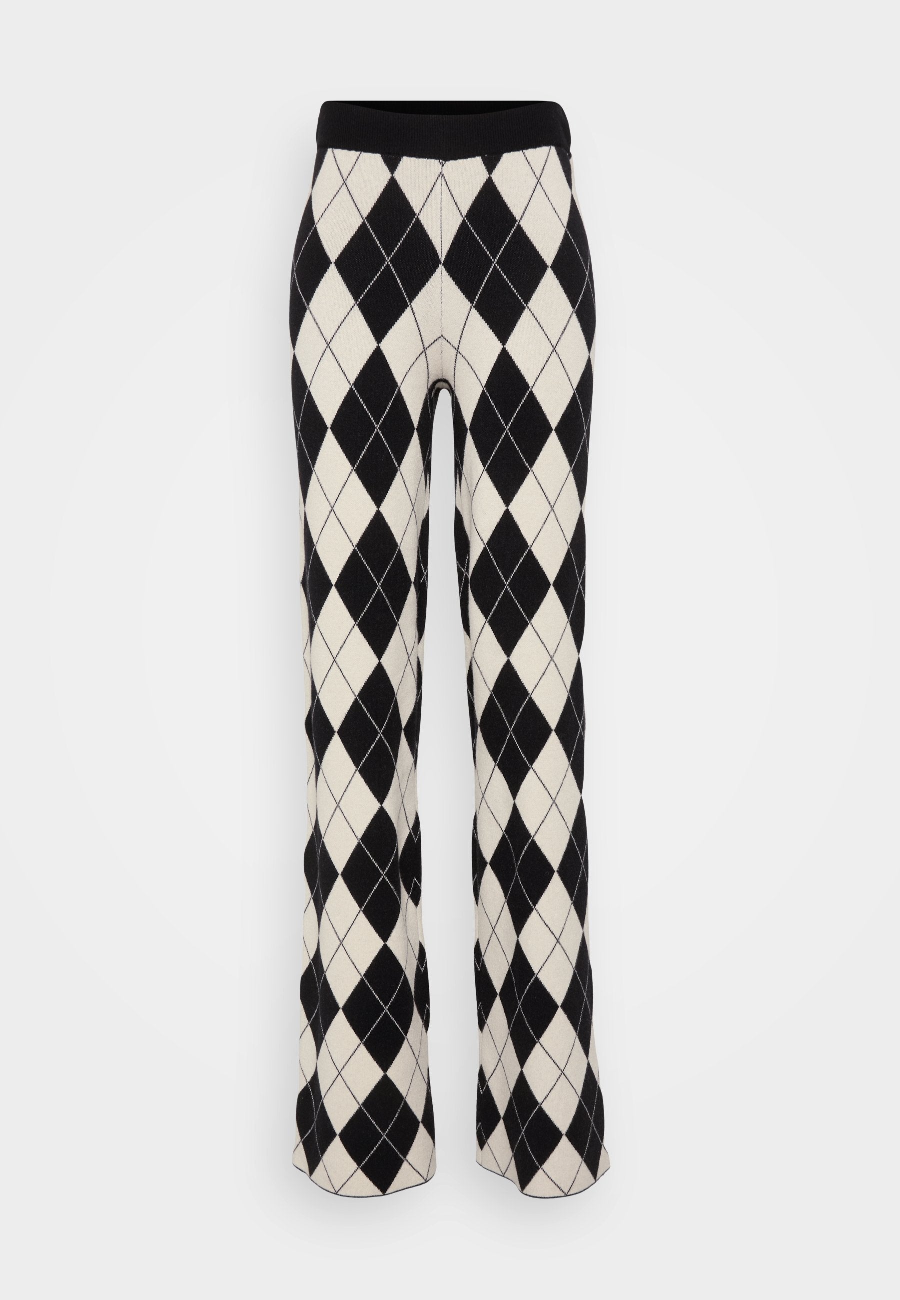 Schwarz-weiße Strickhose mit Argyle-Muster, weitem Bein und elastischem Bund, mit einer weichen Textur und Rautenmuster.
