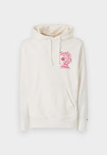 Cremfarbener Hoodie aus weichem Material, mit einer Kängurutasche und einem pinkfarbenen Grafikdesign mit Text auf der Vorderseite. Mit Kordelzügen an der Kapuze.