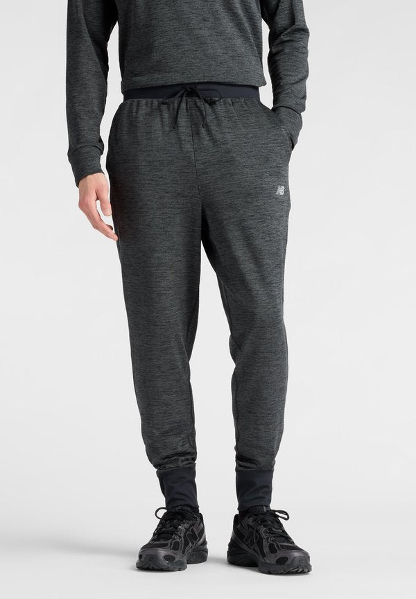 New Balance ATHLETICS HEAT GRID  - Tracksuit bottoms - black