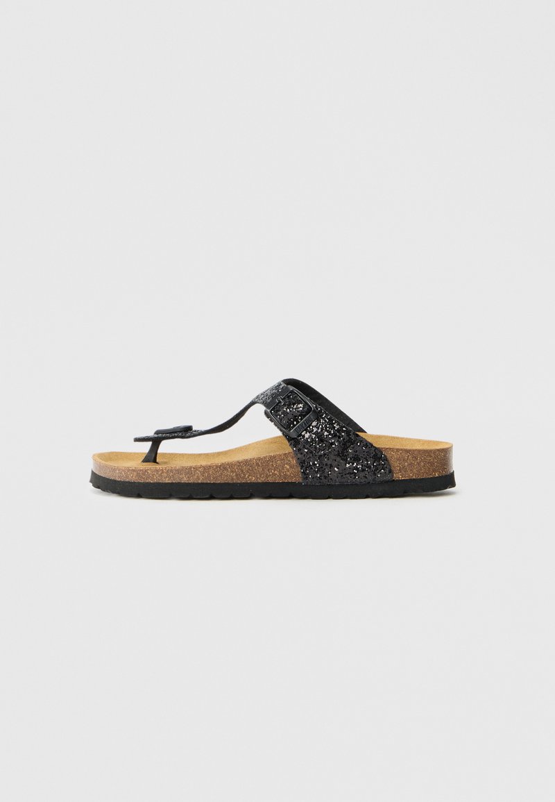 Schwarze Glitzer-Flip-Flop-Sandale mit einem Korkfußbett, ausgestattet mit einem strukturierten Riemen und einer strapazierfähigen Gummisohle für optimalen Halt.