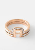 Roségoldring mit einem ausgeschnittenen Design an der Oberseite, akzentuiert durch eine Reihe von Strasssteinen entlang des Bands für zusätzliche Details.