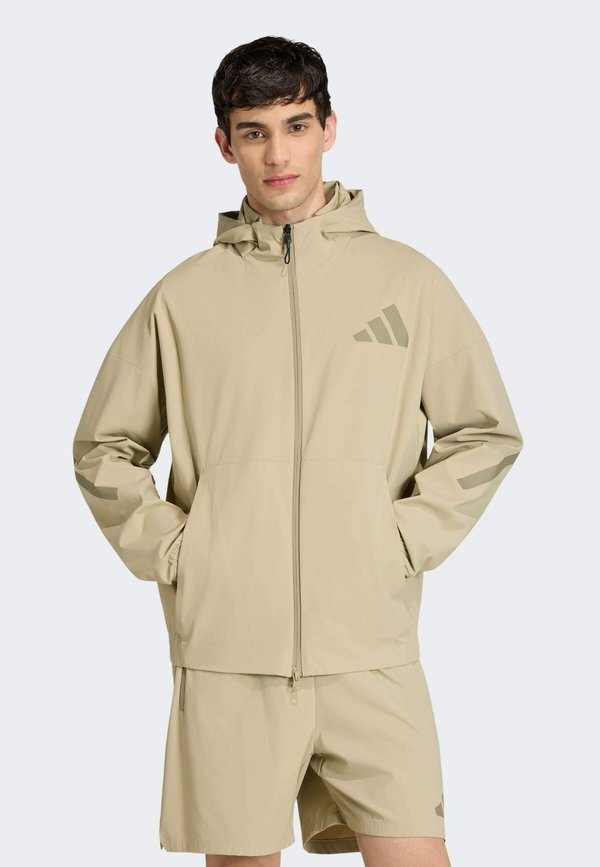 adidas Sportswear ADIDAS Z.N.E. WOVEN TRACK TOP - Training jacket - brown