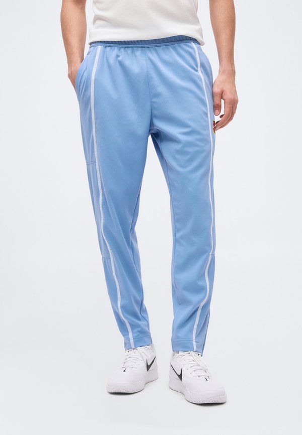 Nike Performance HERITAGE  - Tracksuit bottoms - work blue