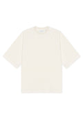 Hellbeiges T-Shirt mit lockerem Schnitt, kurzen Raglanärmeln und Rundhalsausschnitt. Hergestellt aus weichem Stoff, mit minimalistischem Design.