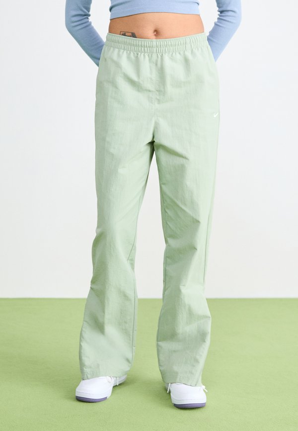 Nike Sportswear ZIP - Tracksuit bottoms - jade horizon/sail