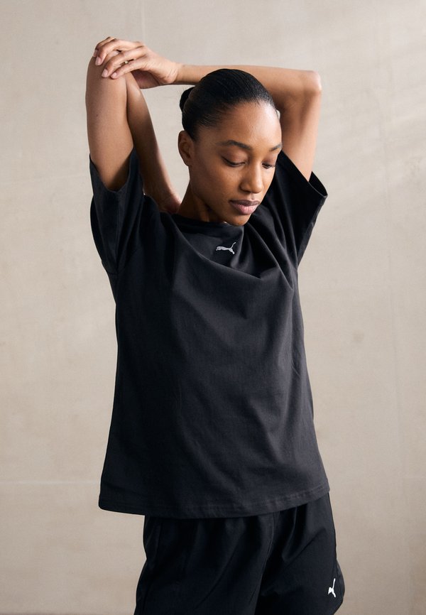 Puma RELAXED FIT - Basic T-shirt - black