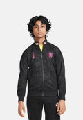 Schwarze Zip-Jacke aus leichtem Stoff, mit dezentem Muster, pinkem Nike-Logo und Wappen. Gerippter Kragen mit farbigen Akzenten.