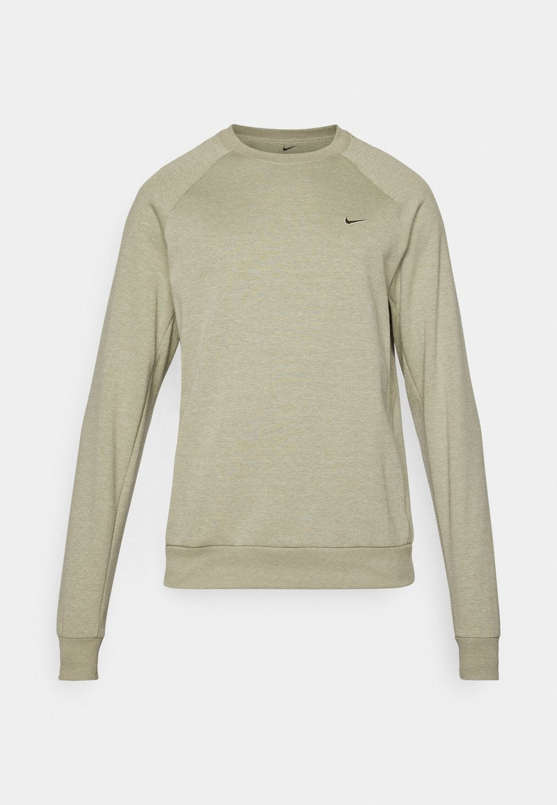 Hellgrünes Sweatshirt aus weichem Stoff, mit Rundhalsausschnitt, langen Raglanärmeln und kleinem schwarzem Nike-Logo auf der Brust.