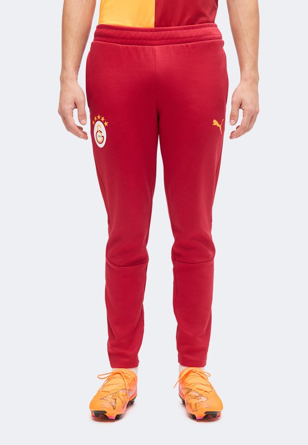 Puma GALATASARAY SK EVOSTRIPE PANTS - Tracksuit bottoms - dark cherry/summer sunset