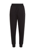 Schwarze Sweatpants mit elastischem Bund und verstellbarem Kordelzug. Schmal zulaufende Beine mit Bündchen an den Knöcheln; Material aus Baumwollmischung.