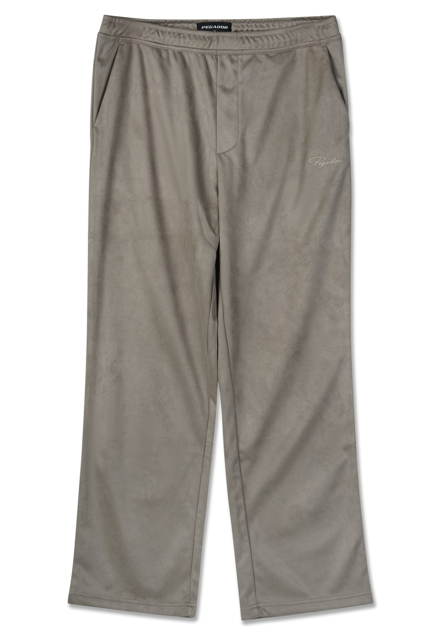 Grau, weiche, wildlederähnliche Stoffhosen mit relaxter Passform, die einen elastischen Bund und seitliche Taschen haben. Dezentes Logo auf der Vorderseite gestickt.