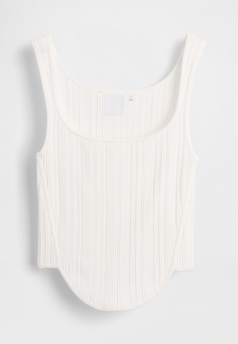 Weißes, geripptes Tanktop mit rundem Ausschnitt, breiten Trägern und geschwungenem Saum, das durch eine weiche Textur und ein minimalistisches Design besticht.
