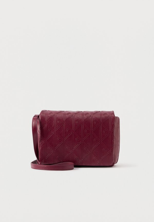 Calvin Klein EMBLEM PUFFER FLAP - Cross body bag - alluring pink