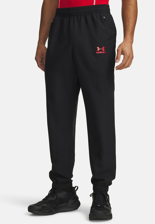 Under Armour TECH SPORT - Tracksuit bottoms - black