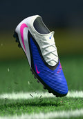 Nike Performance PHANTOM LOW PRO UNISEX - Turf football boots - racer blue/pink blast/white