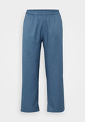 Blaue Leinenhose mit entspannter Passform, ausgestattet mit einem elastischen Bund und geradem Bein. Glatte Textur, minimale Details und keine Taschen.