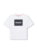 Weißes Baumwoll-T-Shirt mit einem schwarzen, gemusterten Quadrat-Graphic und "HUGO" in fetten weißen Buchstaben in der Mitte. Kurzärmlig, Rundhalsausschnitt.