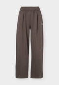 Under Armour RIVAL PLEATED VARSITY - Tracksuit bottoms - peppercorn/bashful pink