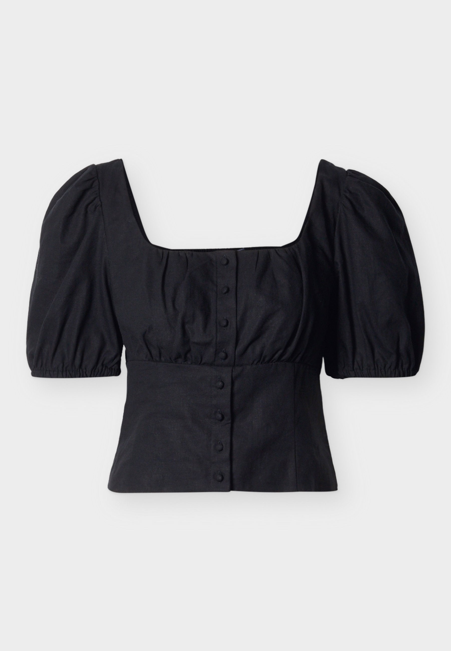 Schwarze, bauchfreie Bluse mit gepufften kurzen Ärmeln, quadratischem Ausschnitt und vorderer Knopfleiste vor einfarbigem Hintergrund.