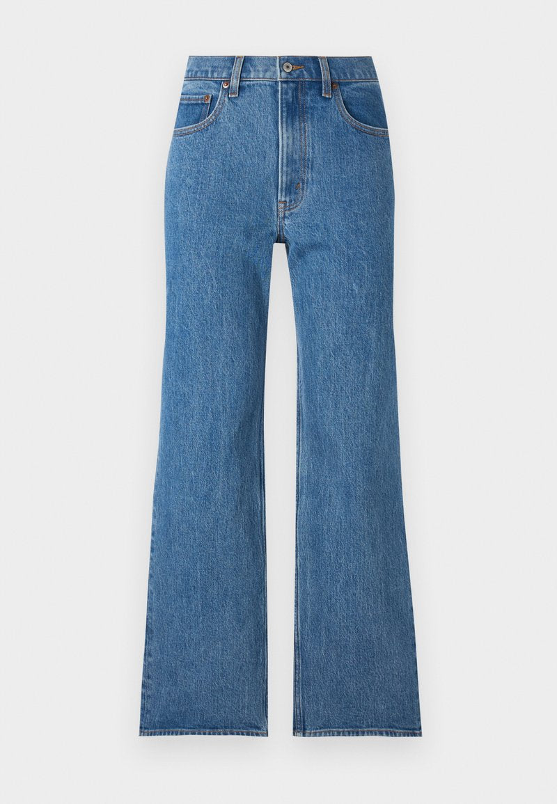 Blaue Jeans aus Denim mit hoher Taille und weitem Bein, ausgestattet mit einem Reißverschluss und fünf Taschen. Der Stoff hat eine klassische Textur mit verwaschenen Details.