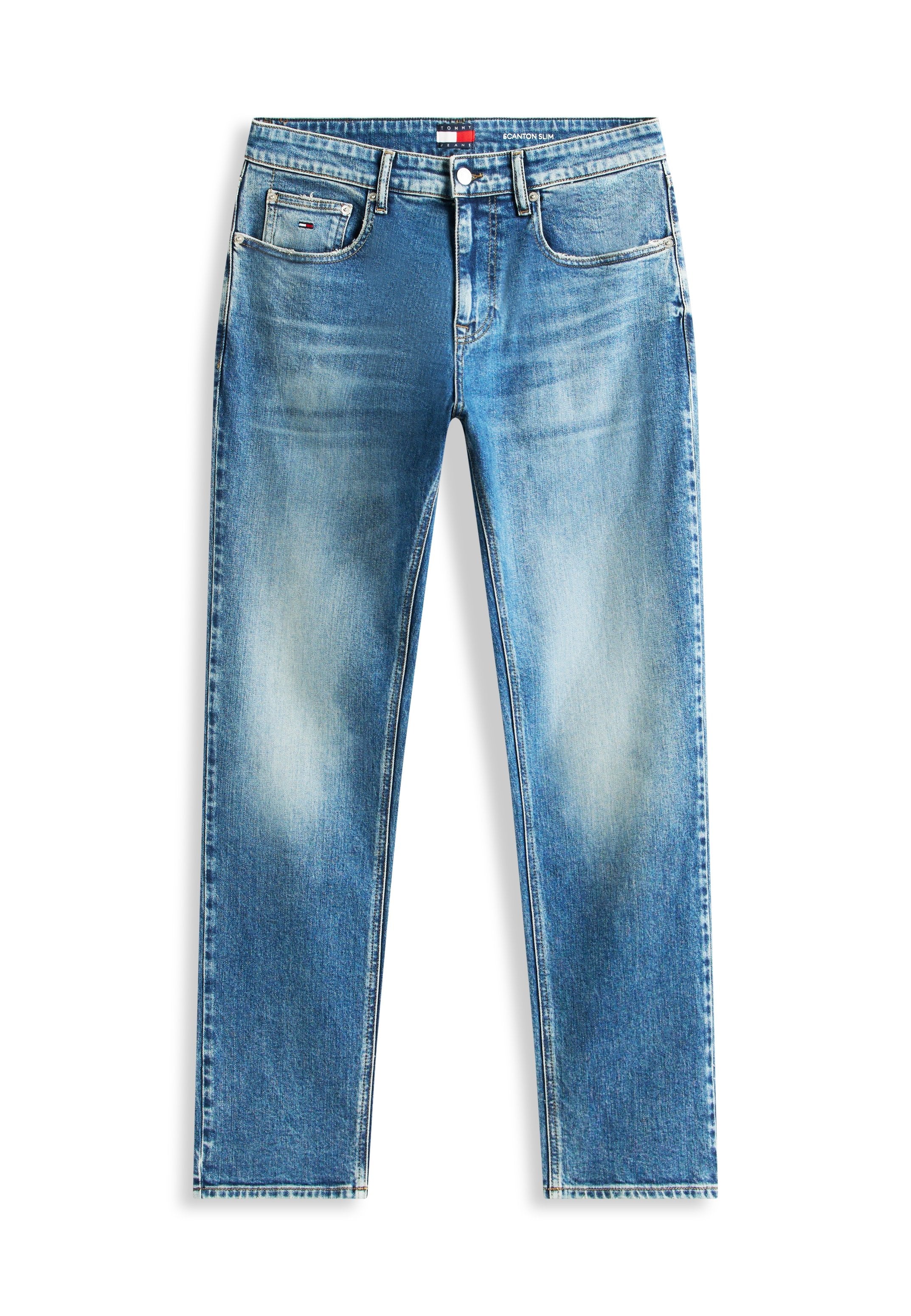 Schmal geschnittene blaue Jeans aus Denim mit ausgewaschenen Details, fünf Taschen, Gürtelschlaufen sowie einem vorderen Knopf- und Reißverschluss.